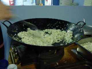 Confection du riz chauffé