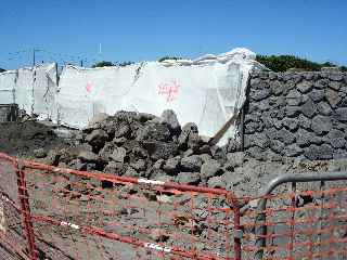 Reconstruction du mur du cimetire